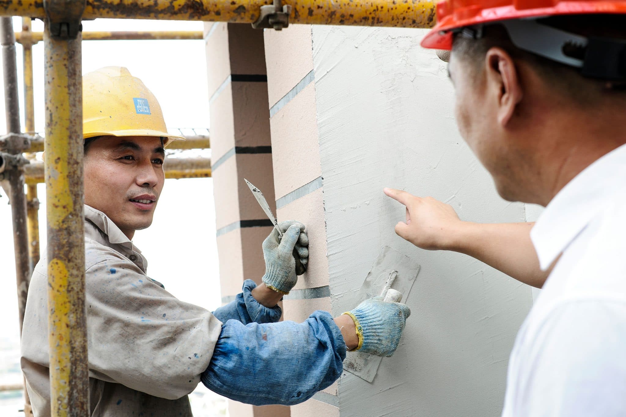 Reportage photo industriel sur un chantier de pose d'enduit Davco à Shanghaï en Chine