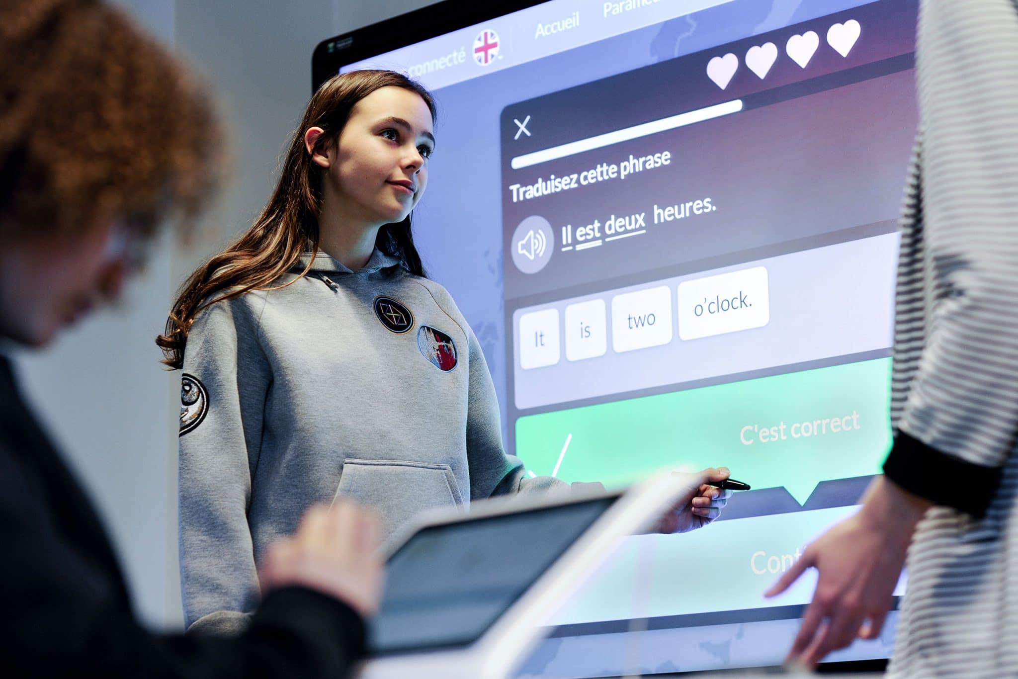 Reportage photo d'ambiances corporate pour Unowhy et la tablette numérique Sqool. Illustration de la classe numérique