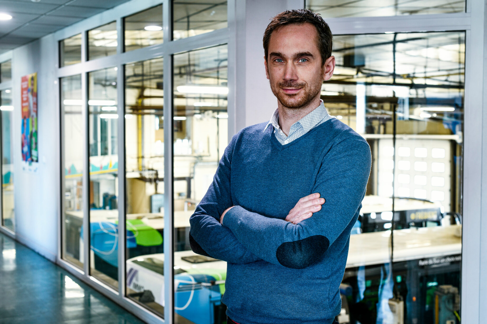 Portrait homme sur site industriel pour la Manufacture Française des Pneumatiques Michelin.